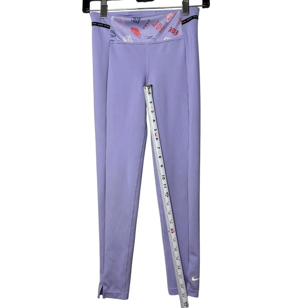Nike Girls Dri-FIT High Rise Graphic Waist Split Hem Leggings Purple Medium M